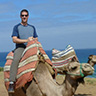 Craig riding on a camel