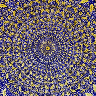 The gold and blue interior of a mausoleum dome